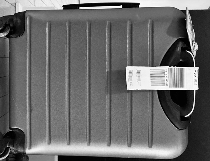 Image of a black, lightweight rolling suitcase
