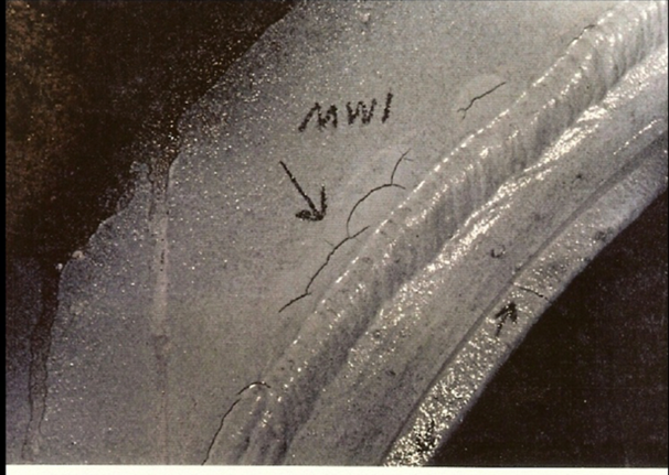 Photo depicting magnetic particle inspection method